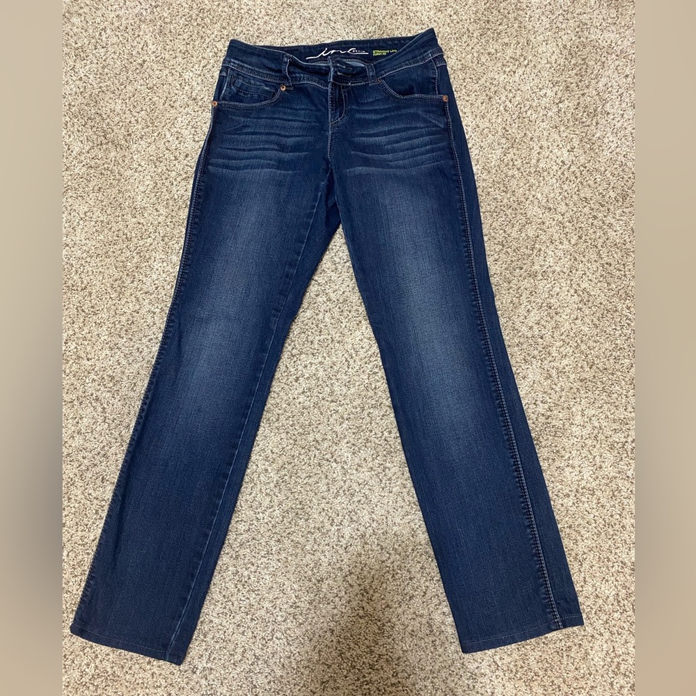 Women’s straight leg jeans by INC; size 2